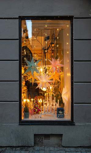 window display lighted star ornament inside room stockholm